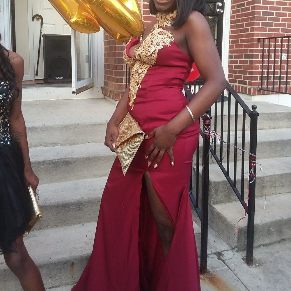 This is a very pretty elegant burgundy dress